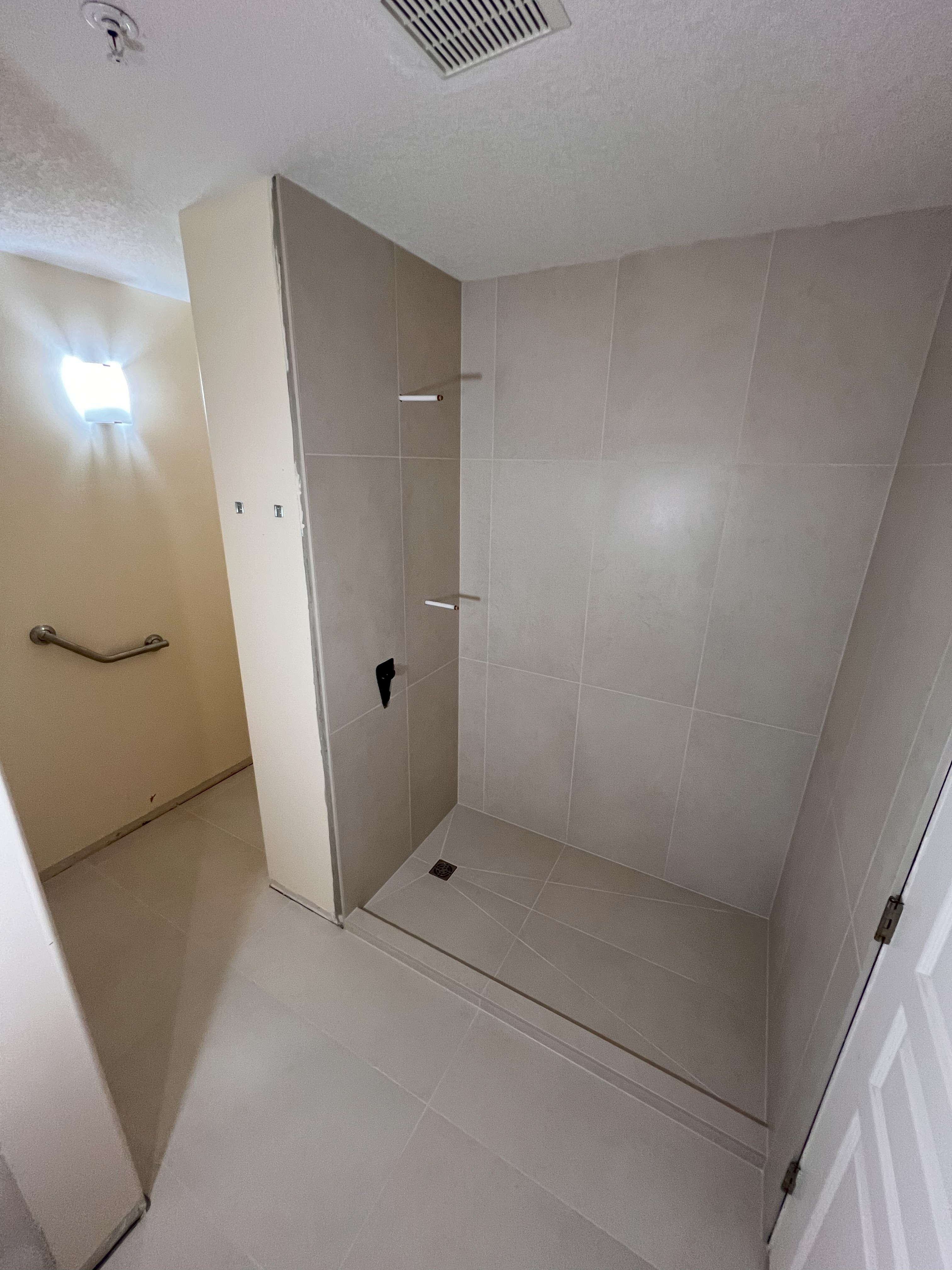 Custom tile feature wall by T² Tile and Flooring